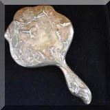 S16. Art Nouveau silverplate hand mirror.
